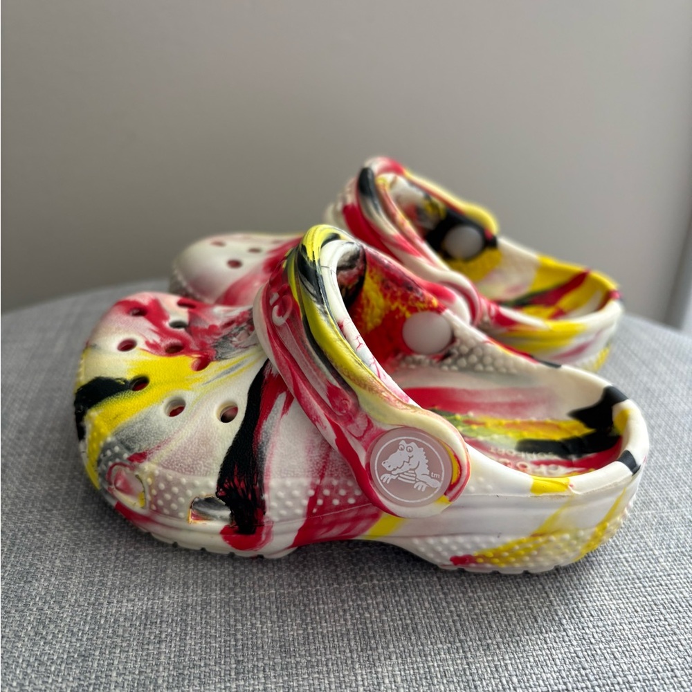 CROCS Toddler size 5 Tie-Dye Clogs - White, Yellow, Red and Black